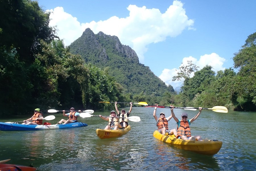 Kayaking along the Nam Song River is the most loved activity in Vang Vieng