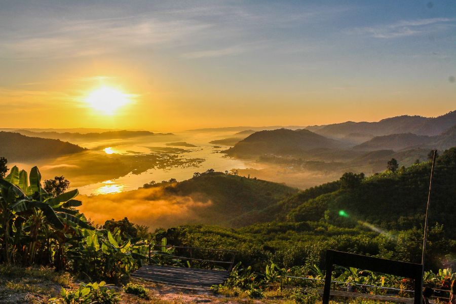 Sunrise over the misty mountains and river valleys of Northern Laos.