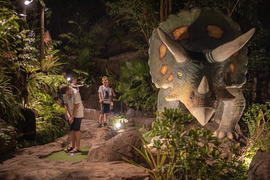 Kids play mini-golf at Dino Park Phuket