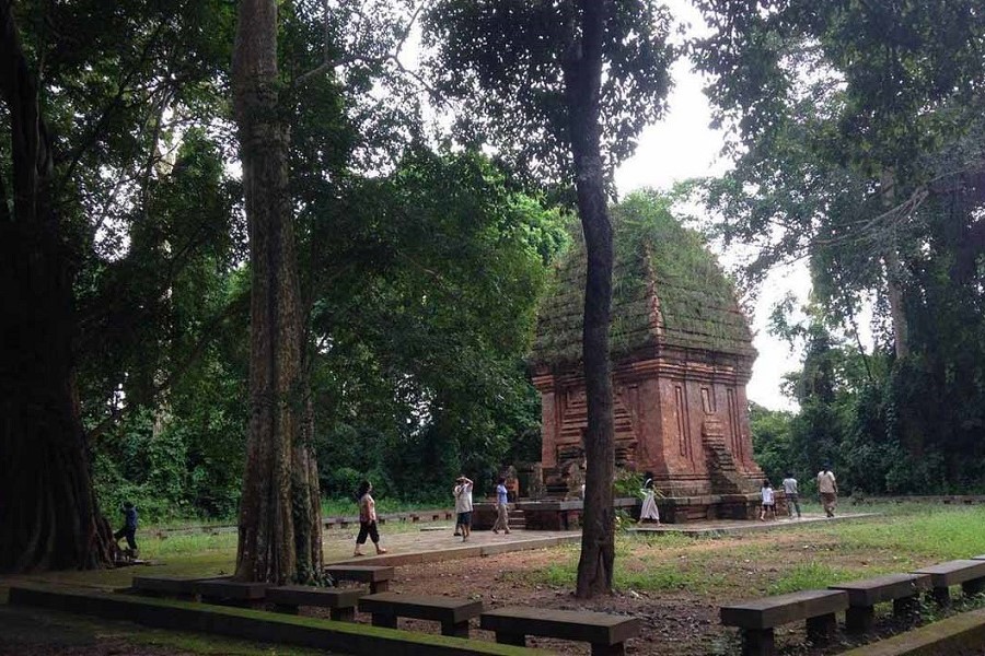 Tourists admire the ancient Cham architecture