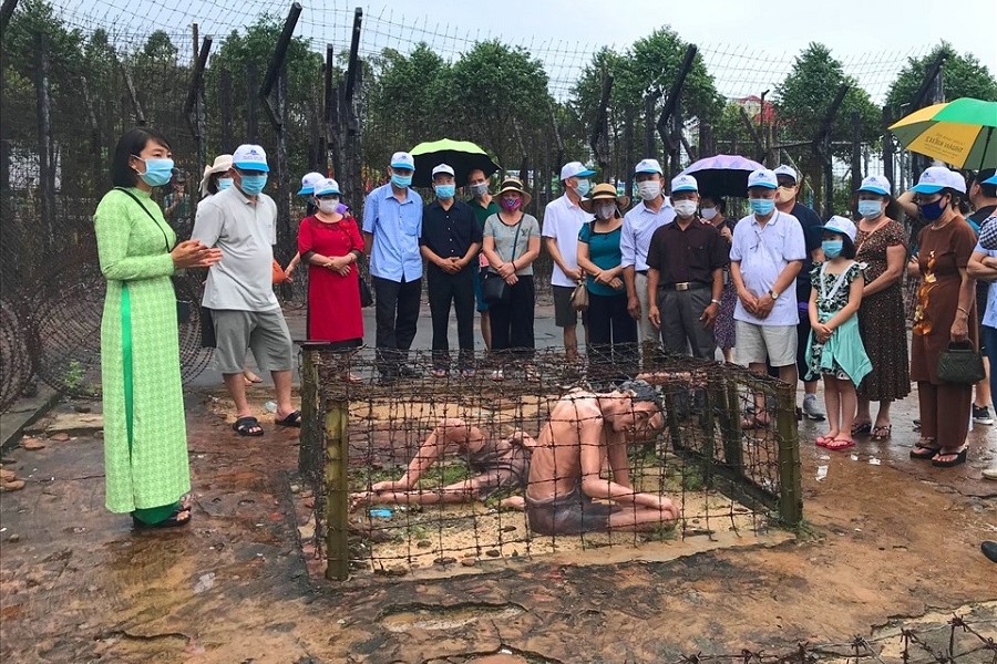 The tour guide retells the cruel torture in Phu Quoc Prison