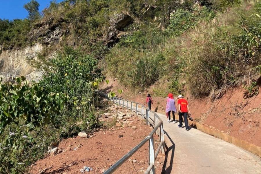 The jungle road to Milestone No. 0 – A Pa Chai Milestone, now paved with asphalt