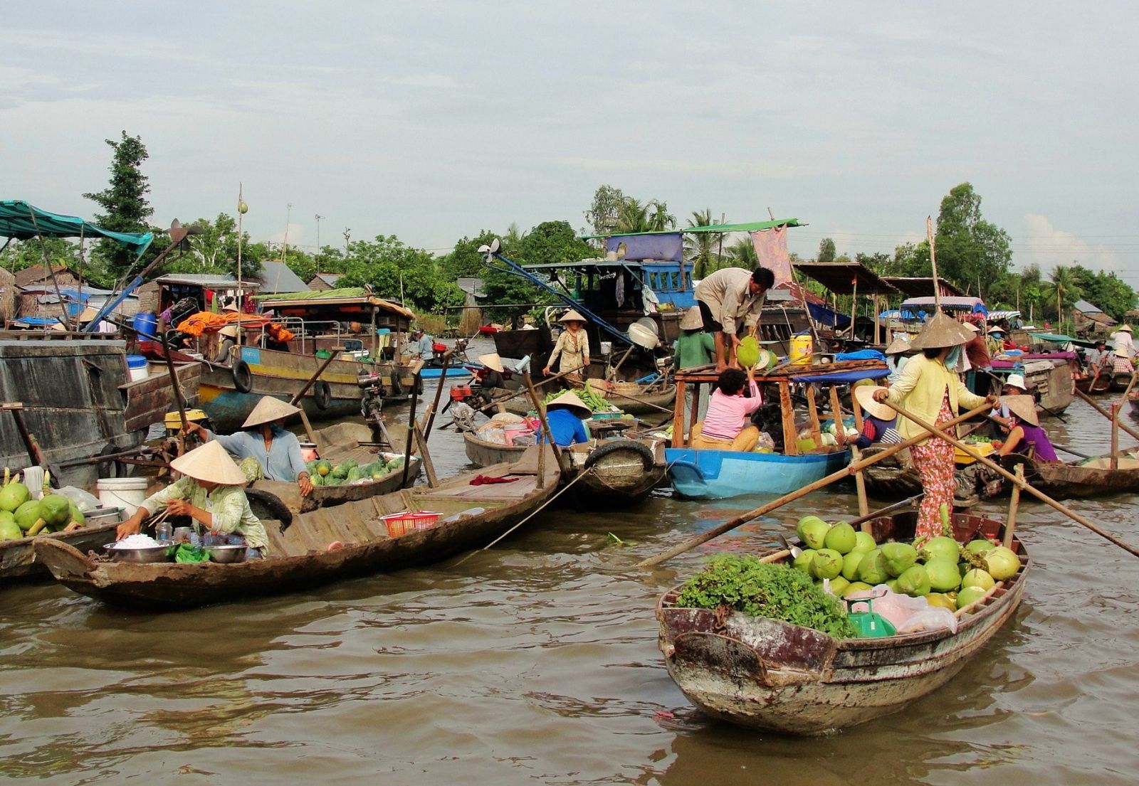 A corner of Cai Be floating market on Mekong River