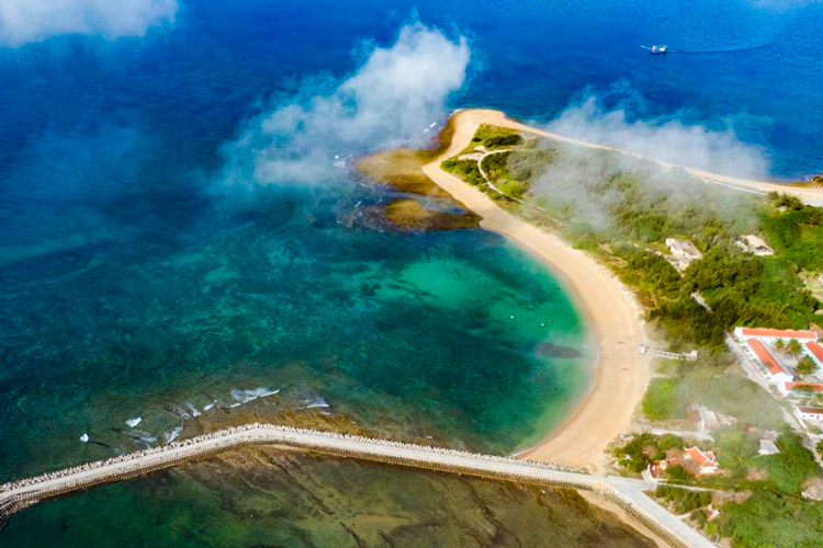 The water is as clear as jade, the white sand stretches long