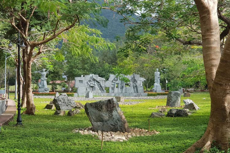 Three sculptures inside the cemetery grounds