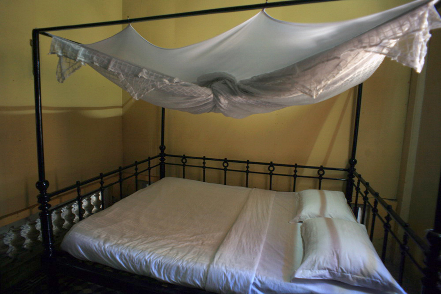 The bedrooms in Huynh Thuy Le Ancient House are exquisite examples of the opulent lifestyle and meticulous craftsmanship of the time