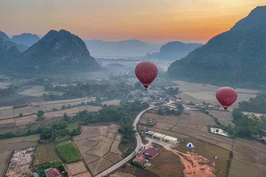 For children over six, a hot air balloon ride can define a 7-day Laos family trip