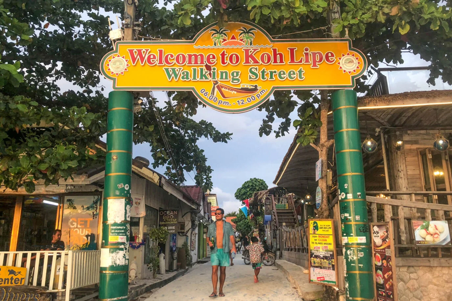 Walking Street on Koh Lipe is a bustling and vibrant pedestrian-only thoroughfare, serving as the main hub for various activities, dining, shopping, and entertainment on the island