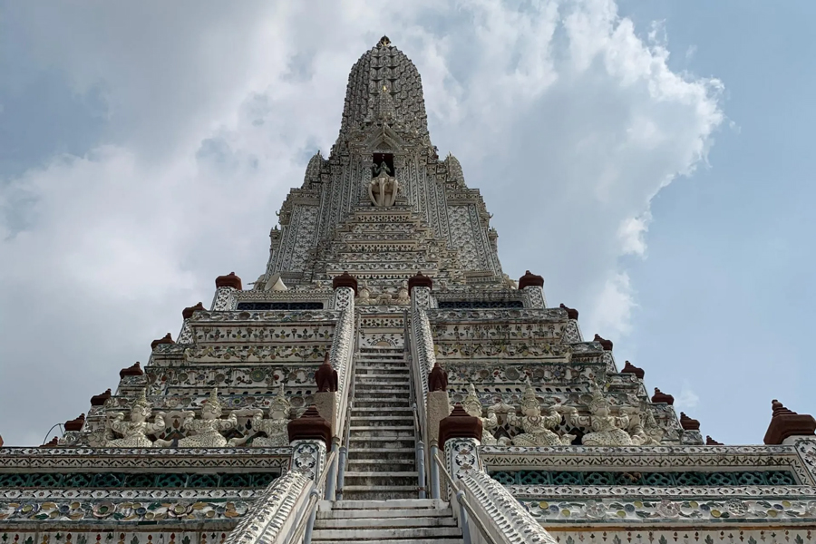 The central prang of Wat Arun stands as a commanding and iconic structure within the temple complex