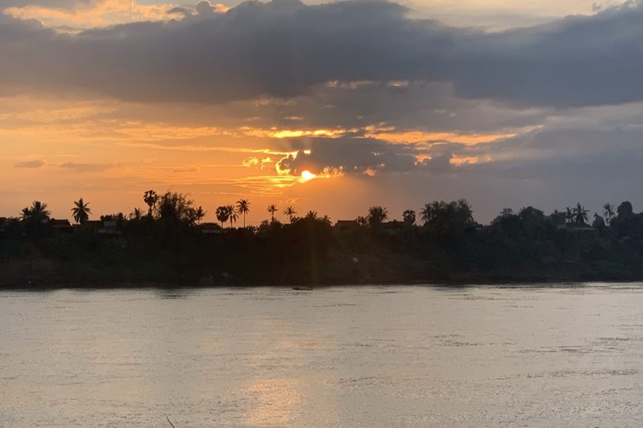 Sunset over the Mekong is one of the simplest and most memorable experiences on Koh Trong.