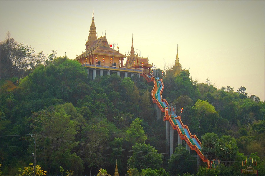 From afar, the pagoda appears to be hovering over the treetops