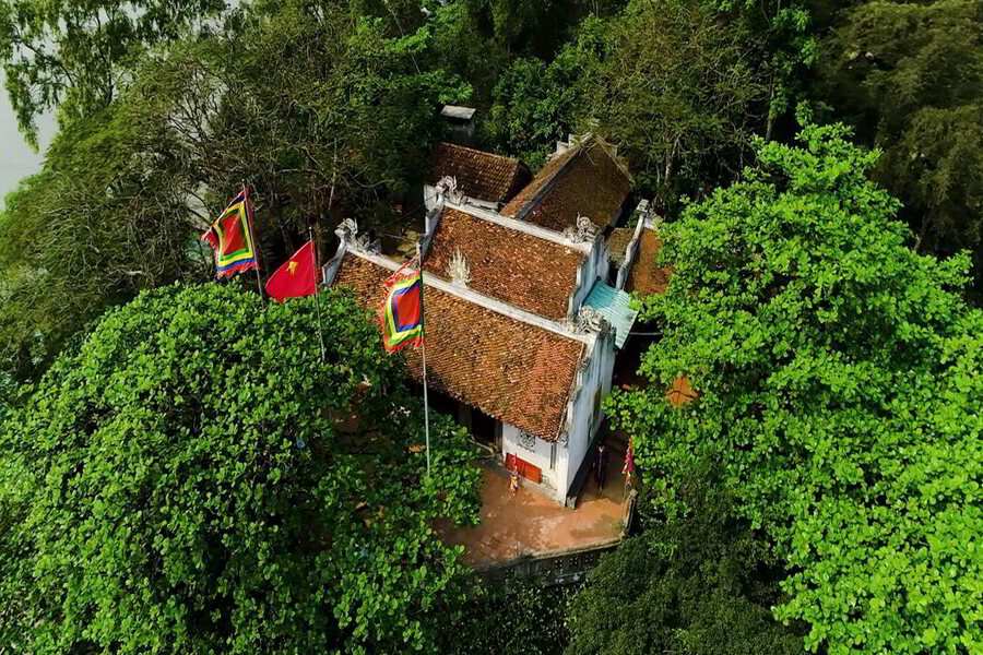 Co Tien Temple surrounded by green trees