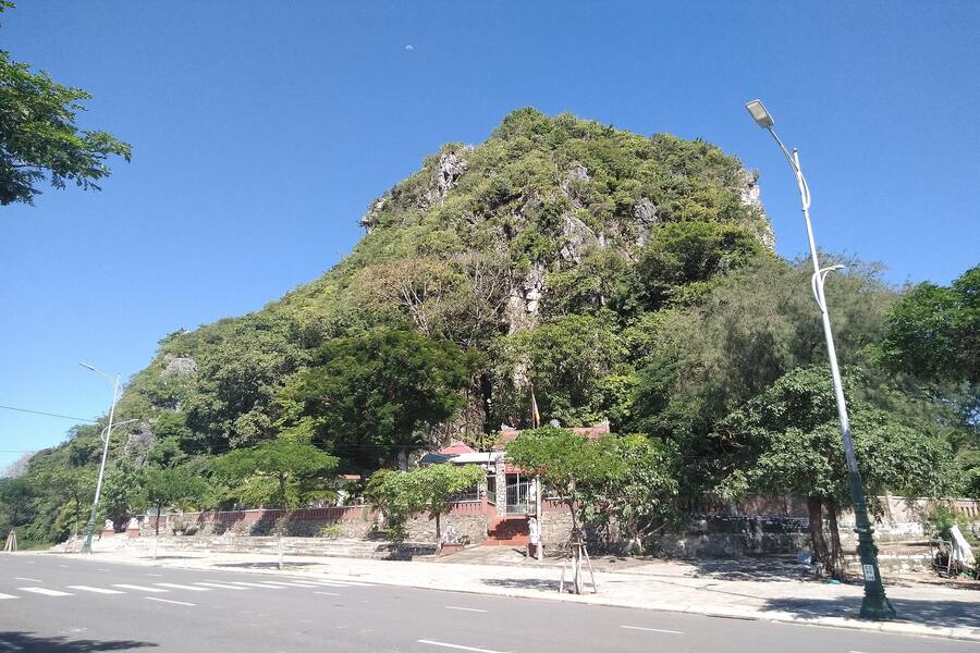 Thuy Son, the largest mountain, is enveloped by lush green trees
