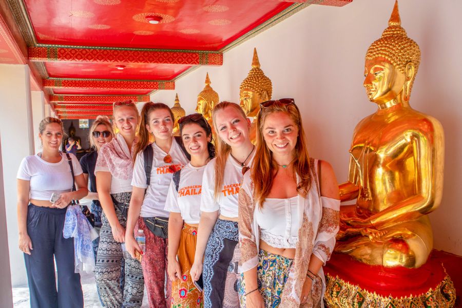 Tourist dress properly visiting temple 
