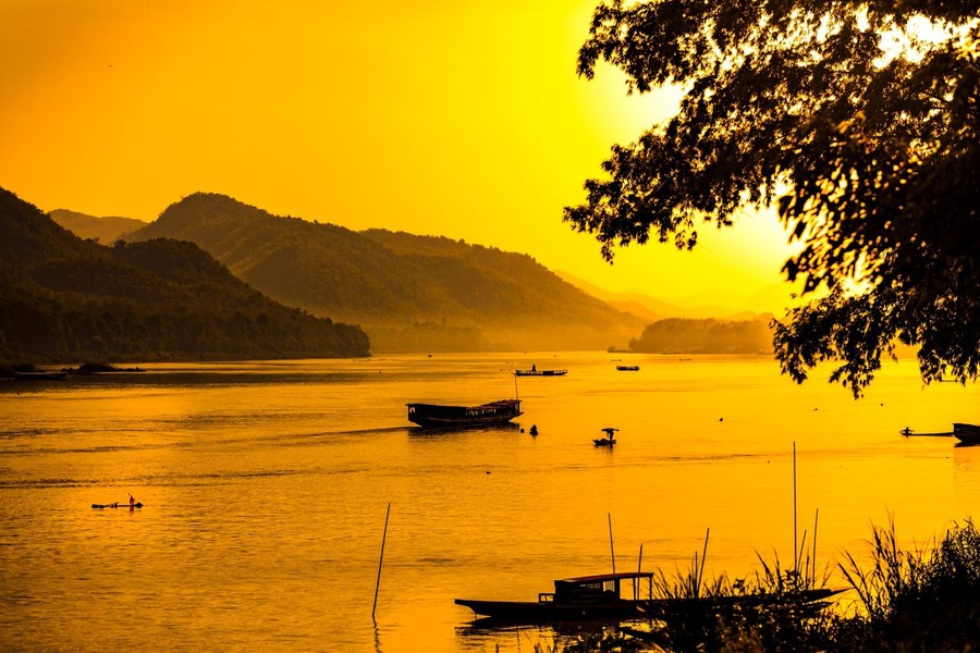 Luang Prabang's sunset by the Mekong River. Photo: Thien Minh Group