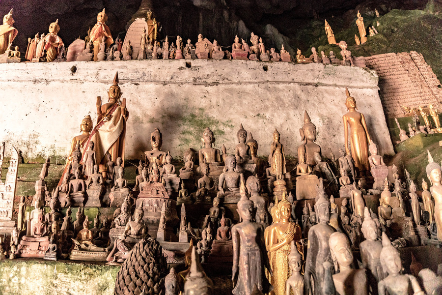 Inside the Pak Ou Caves, there are over 4,000 Buddha statues facing the Mekong River. Photo: Where Tara Went