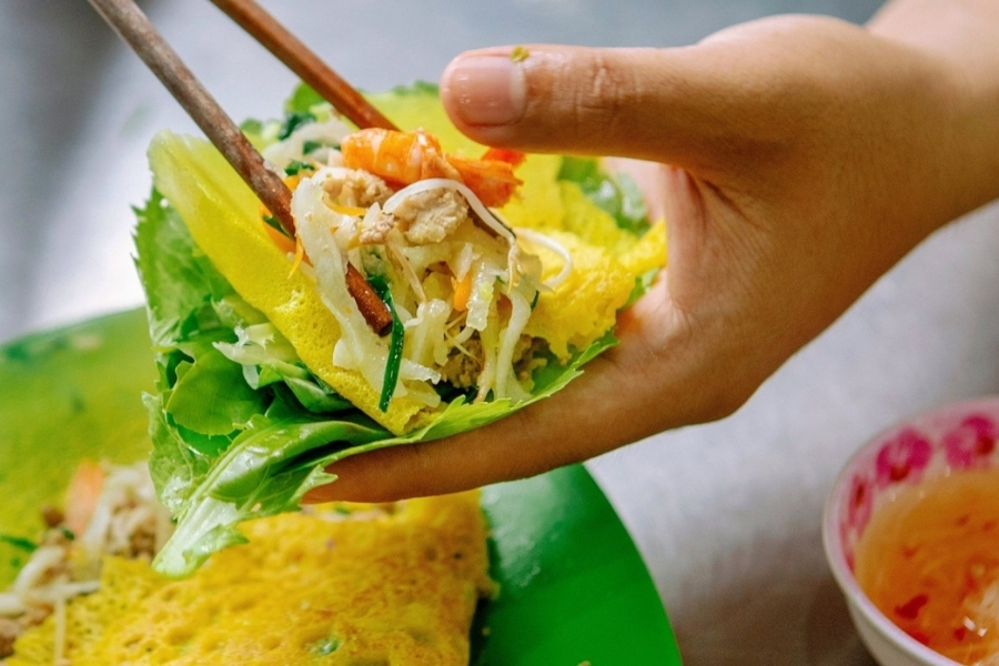Banh xeo is usually eaten with lots of vegetables
