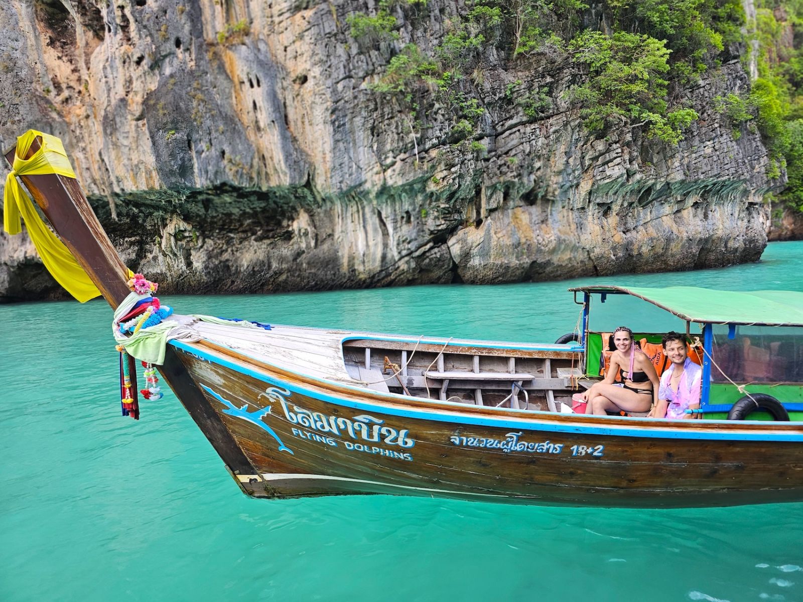 Tourists enjoy a longtail boat tour.