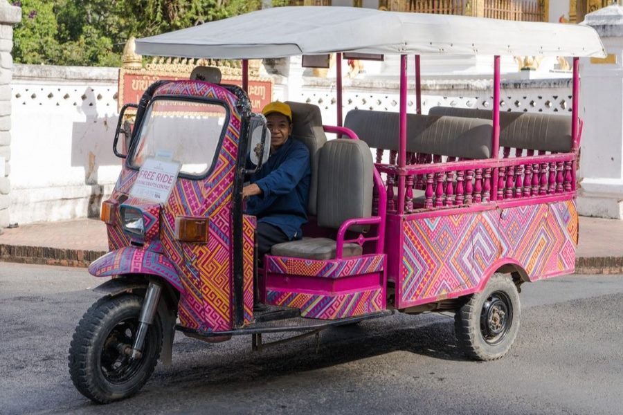 Tuk-tuk picks up free guests of the  Ock Pop Tok Living Craft Center