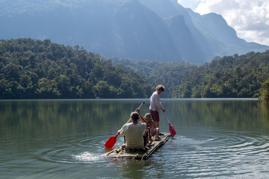 Experience bamboo rafting in Chiang Dao, surrounded by lush nature and mountain scenery.