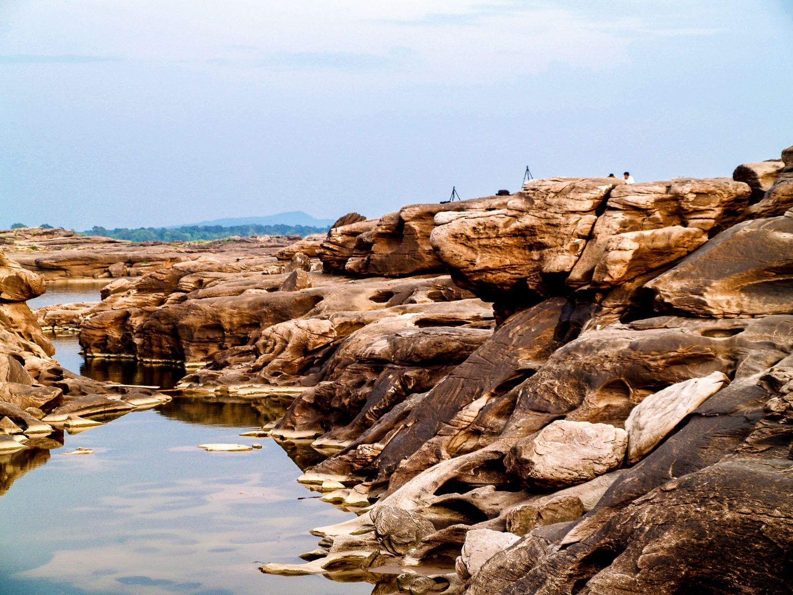 The spectacular scenery of the waterside rock formations at Sam Phan Bok.