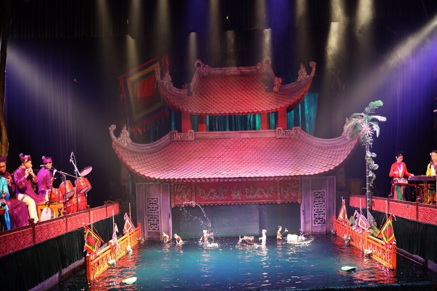 Traditional Vietnamese music complements the water puppet show. Photo: Office of Vietnam President