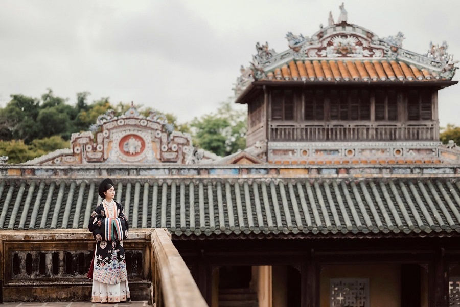 A Young girl wore this precious dress in Hue Imperial City 