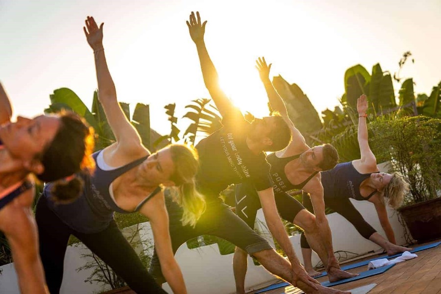 A rooftop yoga session at Navutu Dreams