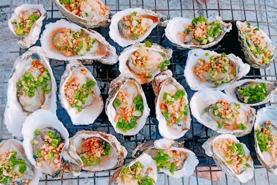 Grilled blood cockles with scallion oil. 
