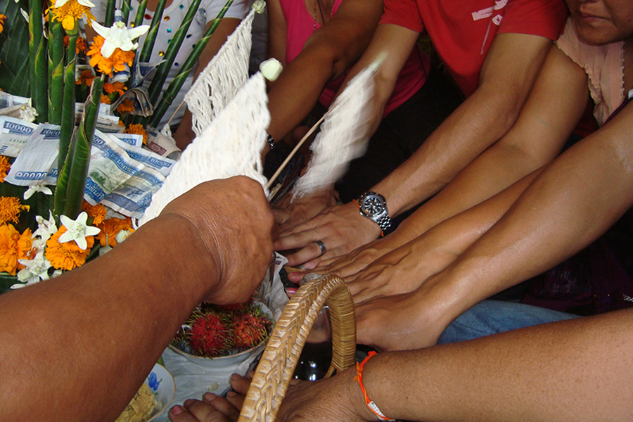 The blessing during Baci Ceremony