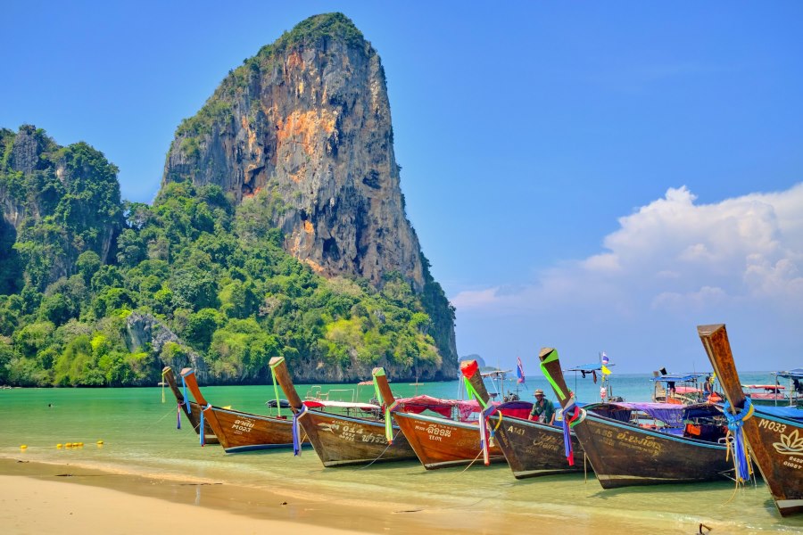 Railay Beach with towering limestone cliffs around (Source: Klook)
