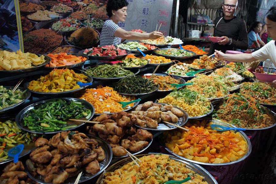 Venturing into the bustling local markets is a feast for the senses, especially when it comes to discovering the must-try dishes unique to each region