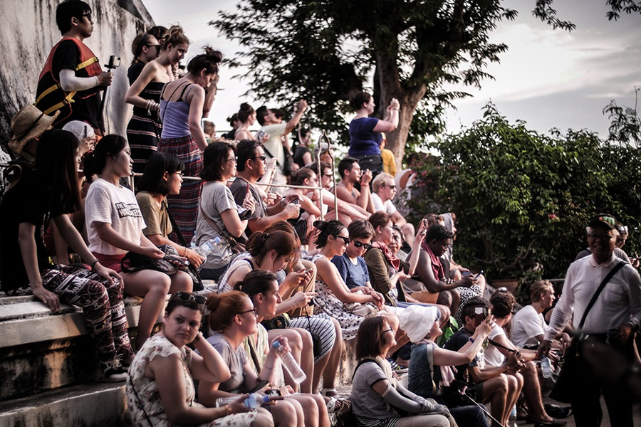 Tourists visiting Phou Si (Cre: Tourism Luang Prabang)