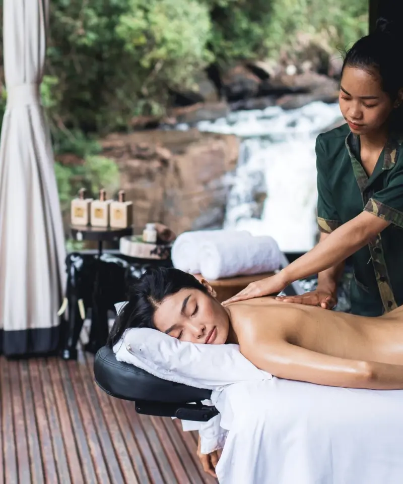 A spa treatment by the waterfall at Shinta Mani Wild